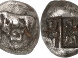 a close up of a silver coin with a picture of a man on it