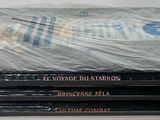 a lot of dvds stacked on top of each other