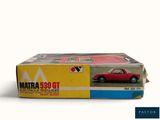 a box with a picture of a red car in it
