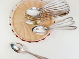 several spoons and spoon spoons on a plate with spoons on it