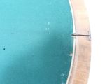 a bird that is sitting on the edge of a pool