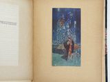 an open book with a picture of a man and a woman sitting on a bench