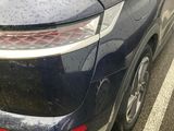 a car that is parked on the side of the street