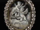 une photo ancienne représentant un chérubin et des anges, dans un cadre en verre