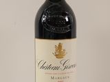 a bottle of wine that is sitting on a table