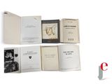 an image of a group of books sitting on top of a white table