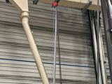 a crane that is sitting inside of a building