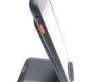 a cell phone that is sitting on a stand