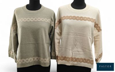 two women ' s sweaters on mannequin mannequin mannequin mannequin mannequin mannequin mannequin mannequin mann