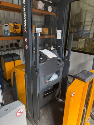 a forklift that is parked in a garage