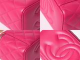 a close up of three pink purses sitting on top of each other