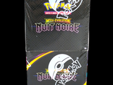 two boxes of pokemon trading cards on a black background