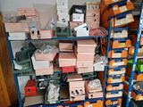 many boxes and boxes on the shelves in the room