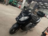 a motorcycle that is parked in a garage