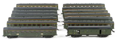 four train cars that are sitting next to each other