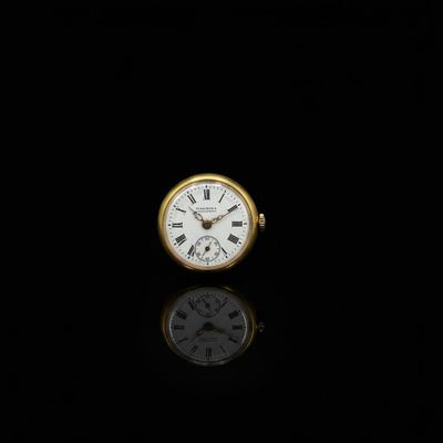 une montre de poche ancienne en or, avec des chiffres romains sur le cadran