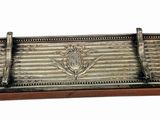 silver plated cigarette case with a flower design on the front