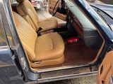 a picture of the inside of a car with leather seats