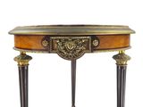 a small table with a clock on top of it