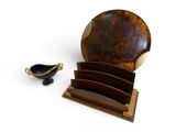a small bowl and a small plate on a stand