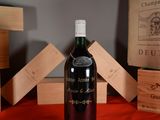 a bottle of wine that is sitting on a table