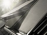 a black and white photo of a roof with solar panels on it