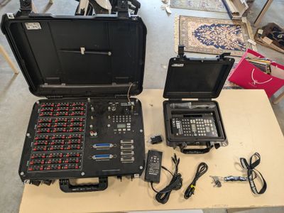 two laptops that are sitting on a table