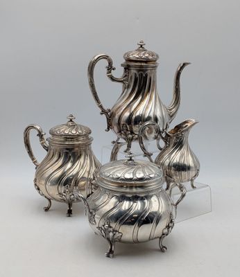 three piece silver plated tea and coffee set on stand