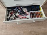 a drawer that has a bunch of items in it