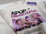 a t - shirt with a picture of two women on it