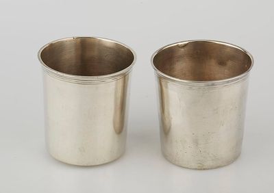 pair of silverplated cups with handles and handles