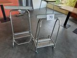 two chairs that are next to each other in a room