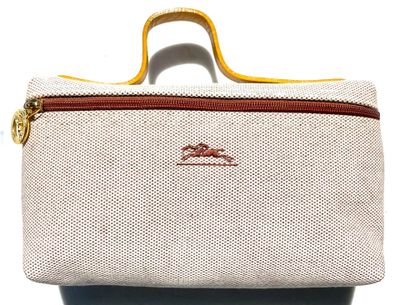 a close up of a white bag with a yellow handle