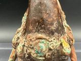 an image of a statue of a horse with a bird on it ' s back