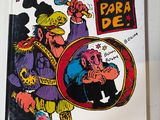 la couverture d'une bande dessinée représentant un homme en costume tenant une épée
