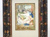 un vieux cadre contenant le portrait d'une femme et d'un enfant