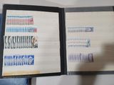 a book with stamps on it sitting on a table