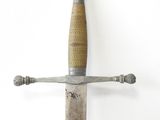 an old sword with a wooden handle on a white background