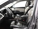 a picture of the interior of a car with the door open
