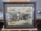 painting of a man riding a horse on display in a room