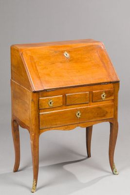 an old wooden desk with a drawer on top of it