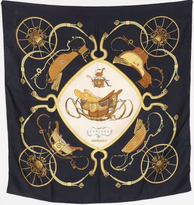 a scarf with a picture of a horse and carriage on it