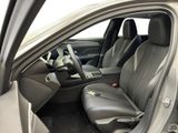 the interior of a car with the door open showing the driver ' s seat area