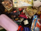 a pile of toys and games on the floor