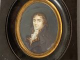 portrait of a man in a blue coat and white shirt in a black frame