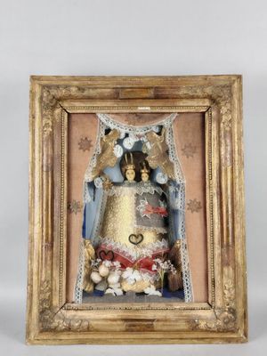 an image of a picture of a statue of a woman in a gold frame