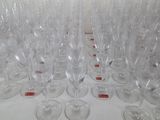 many empty wine glasses on the table ready to be filled