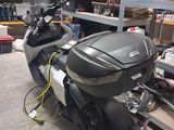 a motorcycle that is parked in a garage