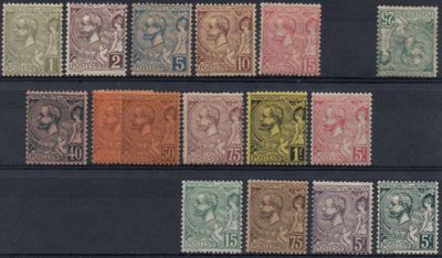 a close up of a group of stamps on a black surface