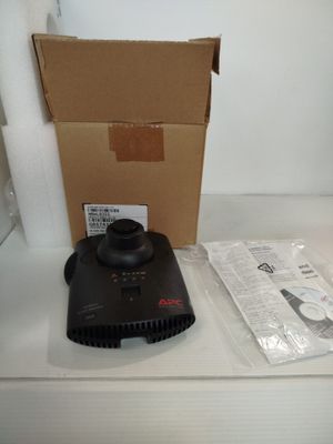 a box with a remote control sitting on top of a counter